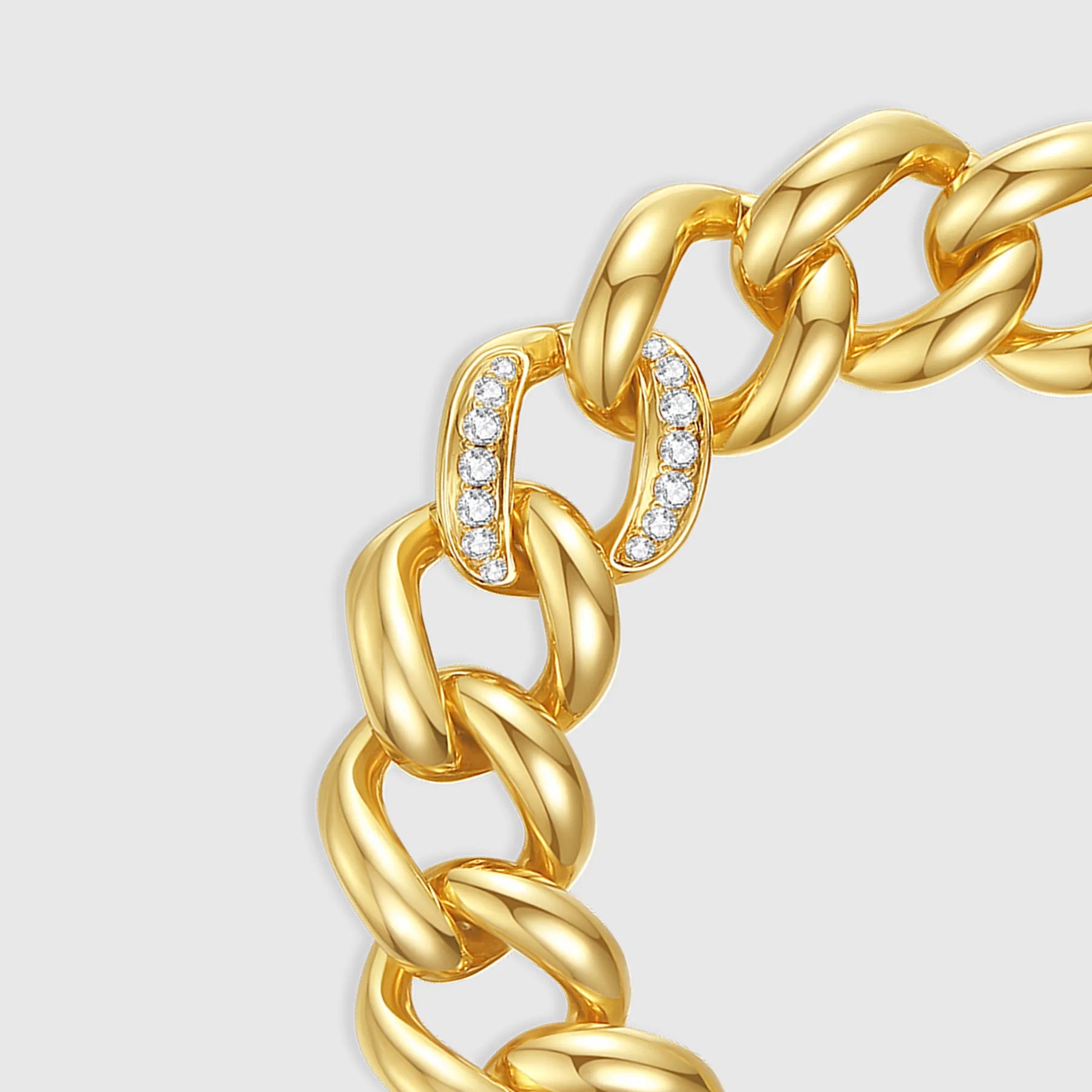 Gold Cuban link bracelet with diamond pavé detail
