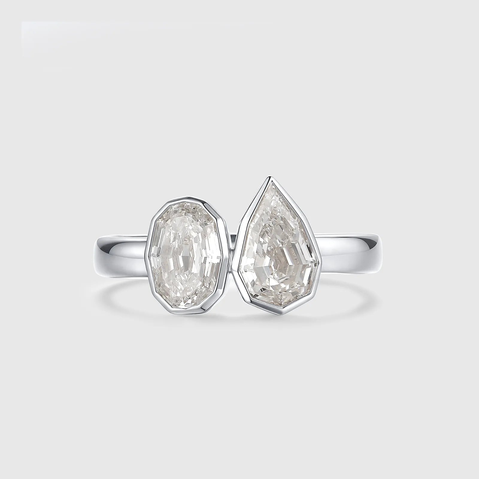 Oval and pear cut lab diamond ring, white gold setting