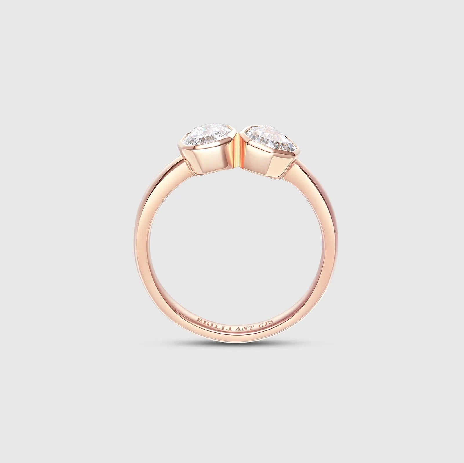 Rose gold ring with two step-cut lab diamonds