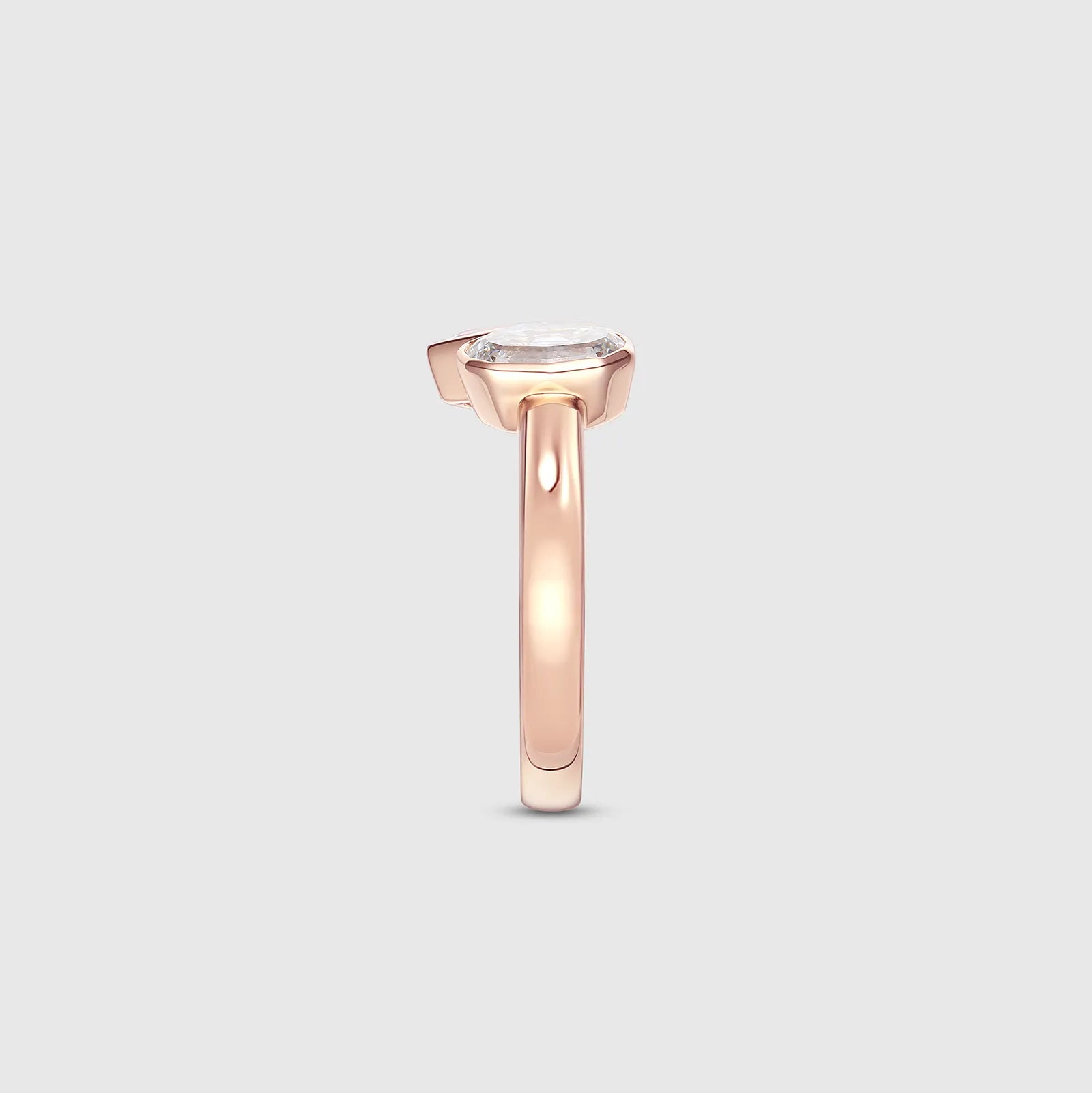 Rose gold ring with oval and pear cut lab diamonds