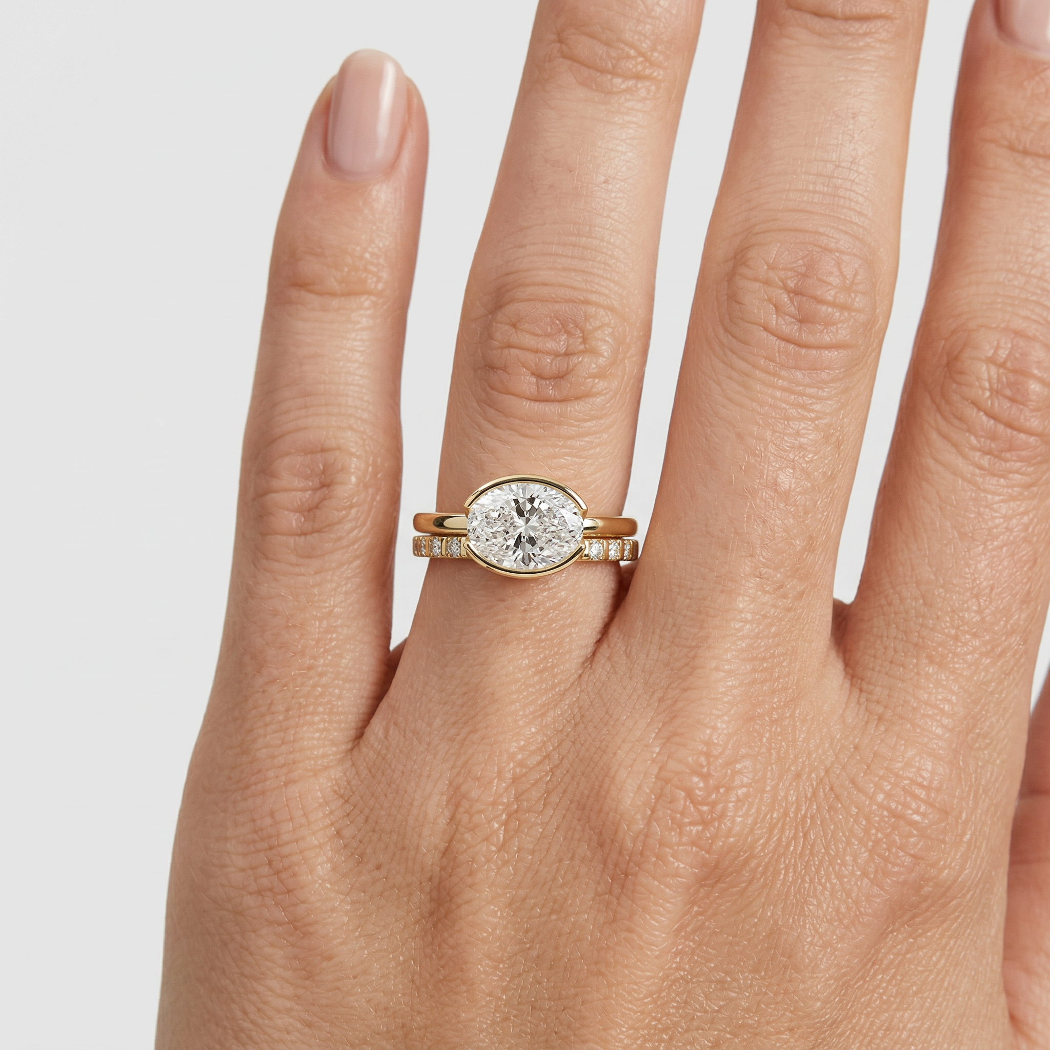 West-East Bezel Oval Lab Grown Diamond Golden Ring