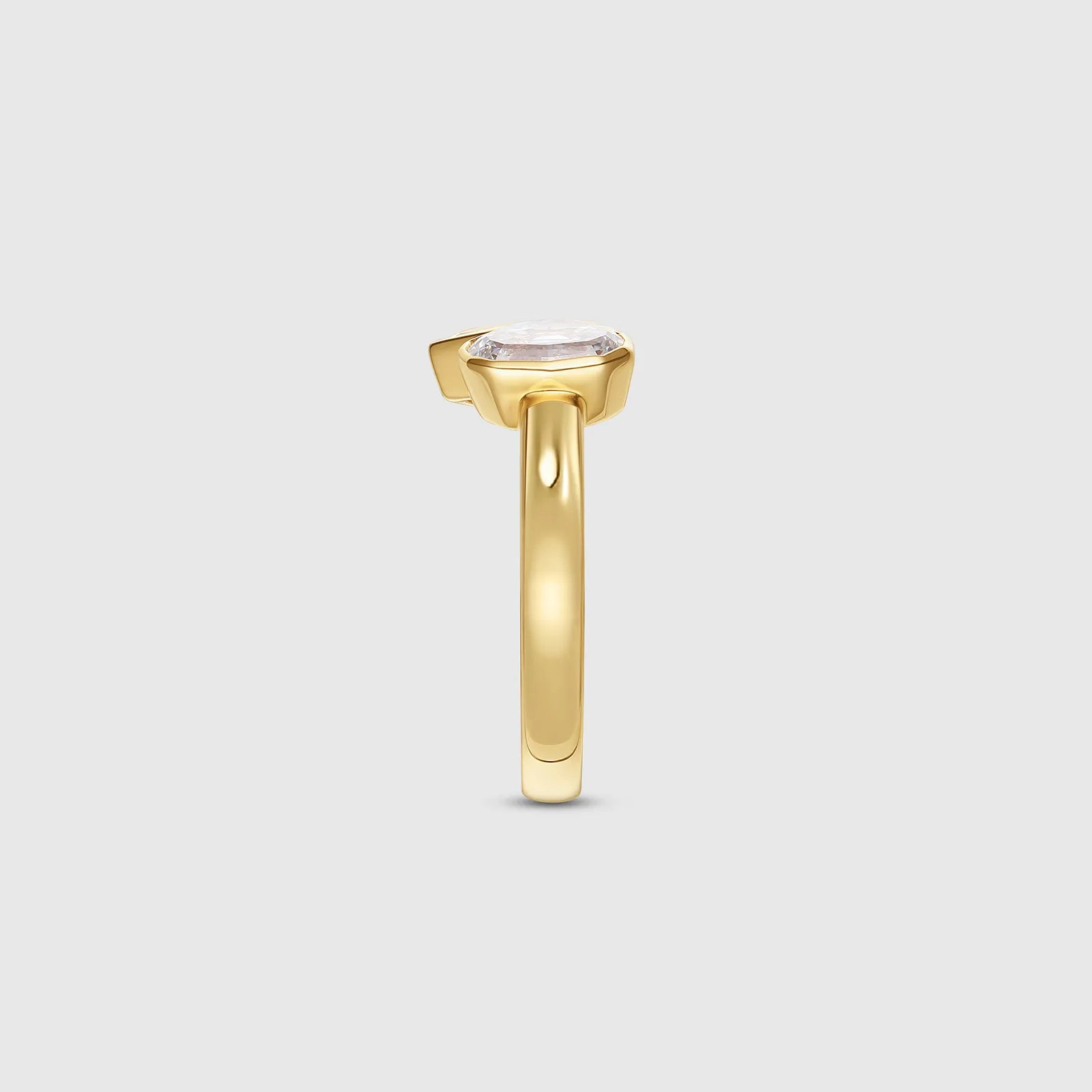 Yellow gold ring with pear cut lab diamond, side view