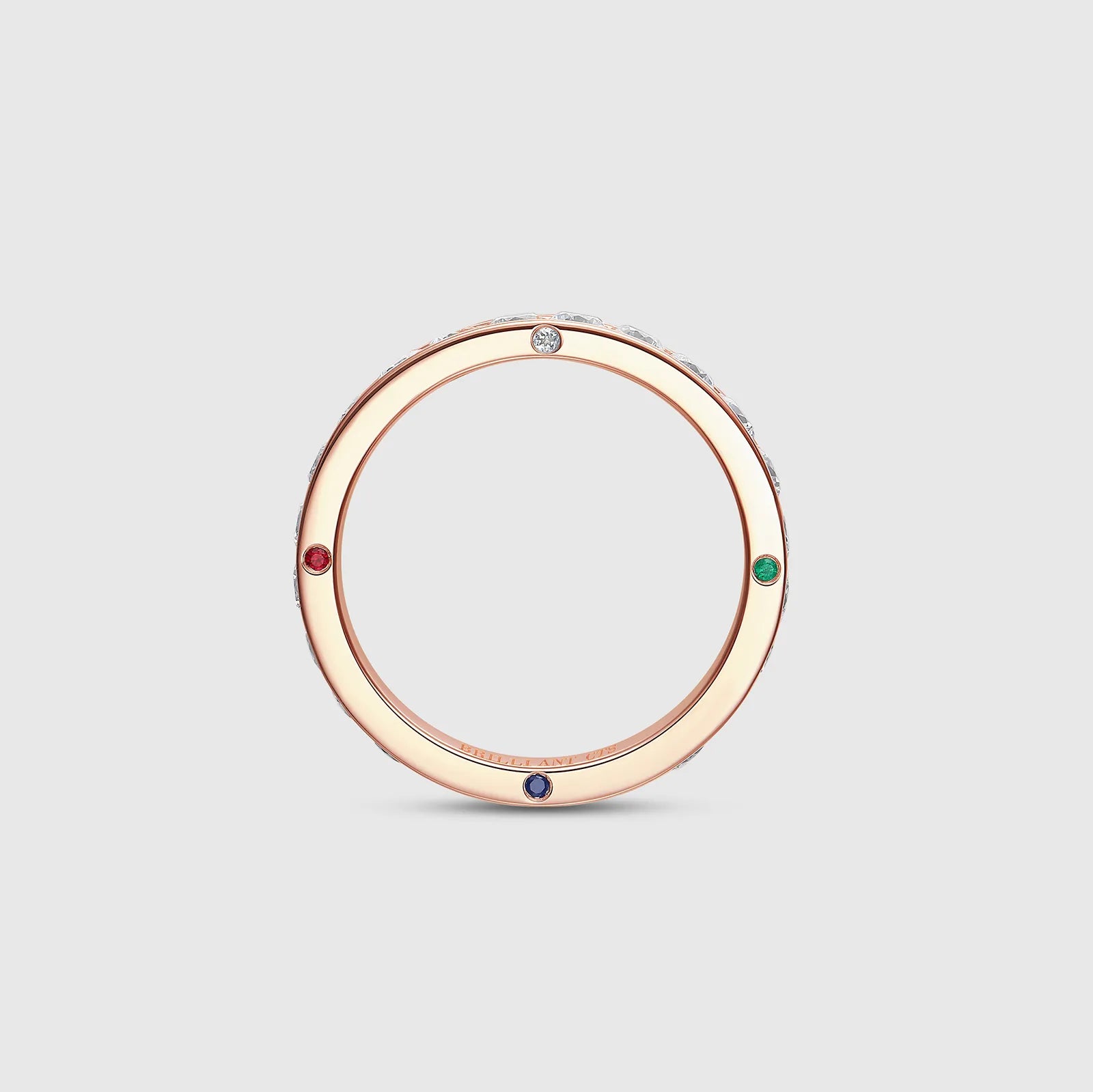 Rose gold eternity ring with colorful gemstones