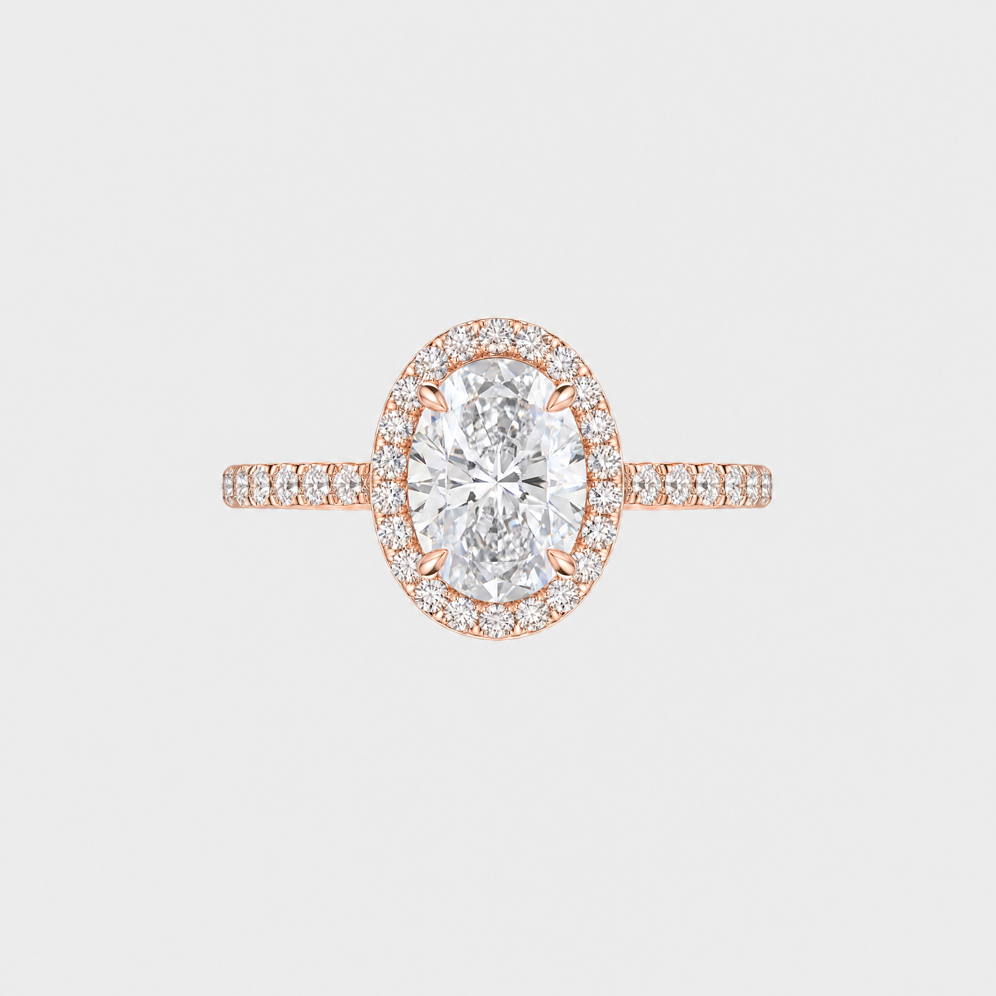 Front view of an oval-cut center stone engagement ring with a halo and rose gold pavé band.