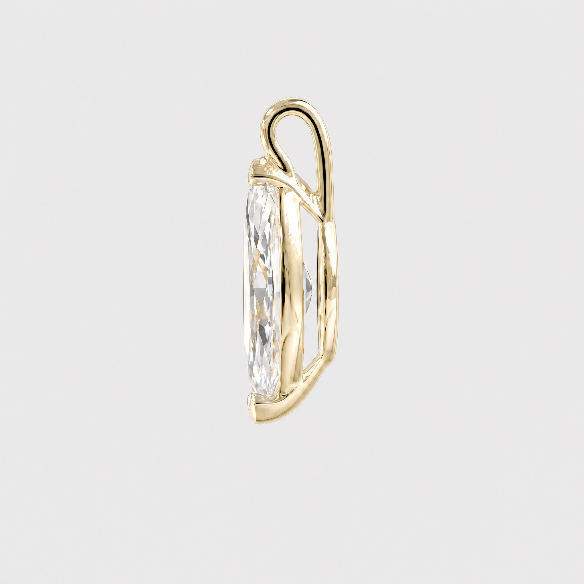 Side view of a marquise-cut solitaire pendant in yellow gold showing the open setting and bail.