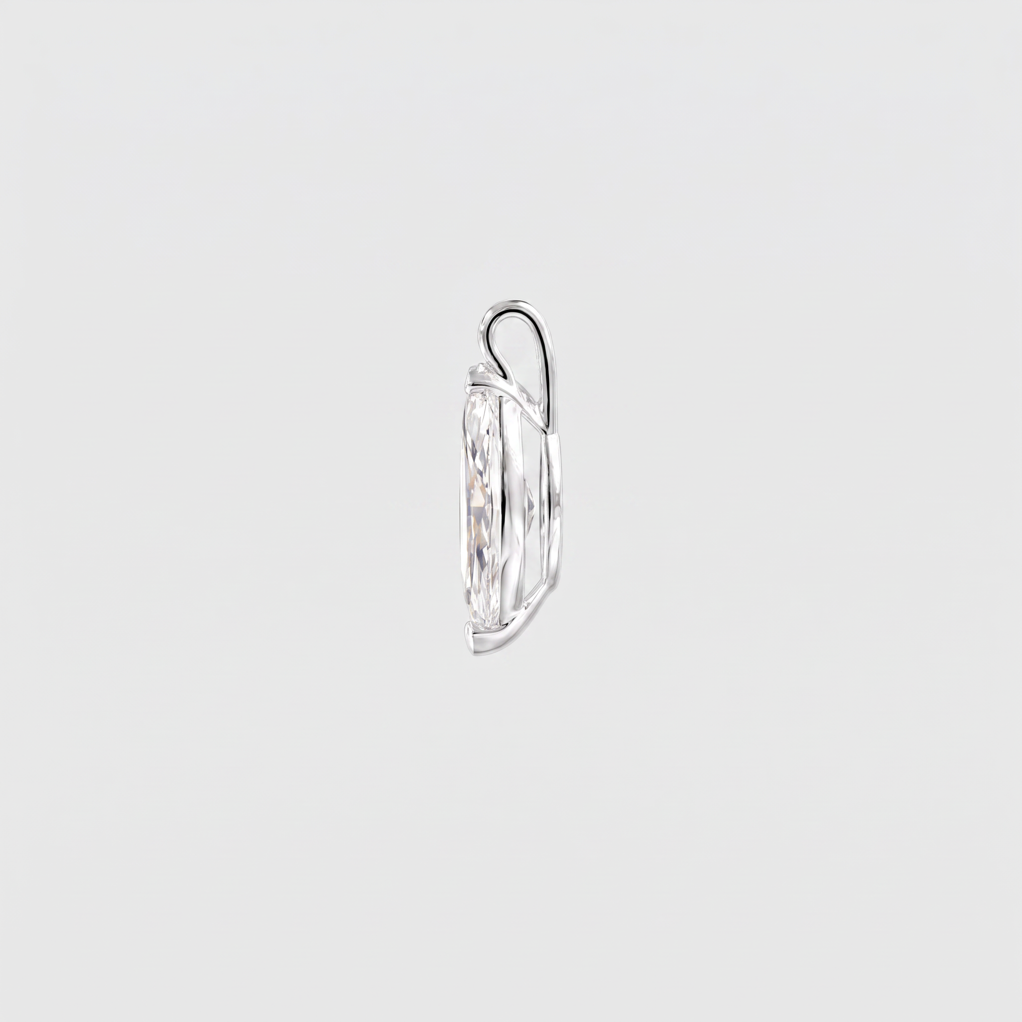 Side view of a marquise-cut solitaire pendant in white gold showing the open setting and bail.