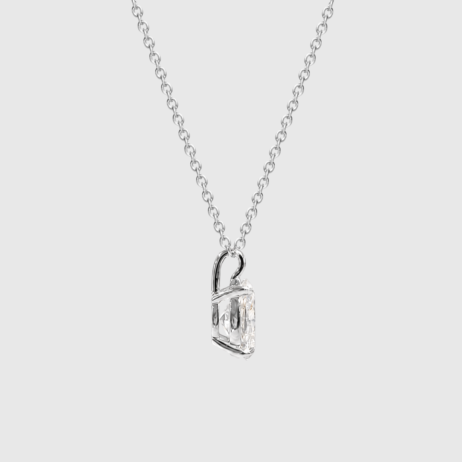 White gold oval diamond pendant side view.