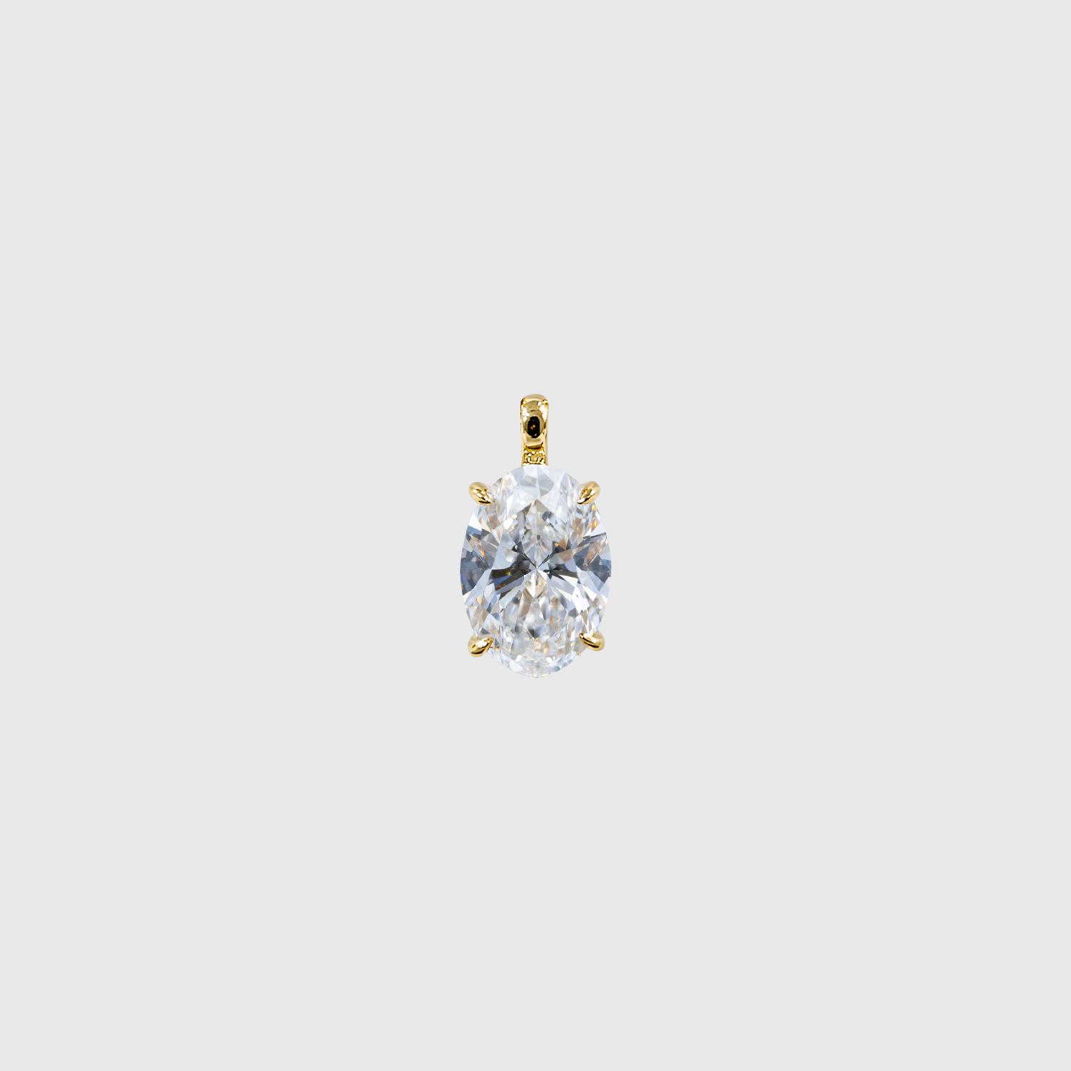 Yellow gold oval diamond pendant front view.