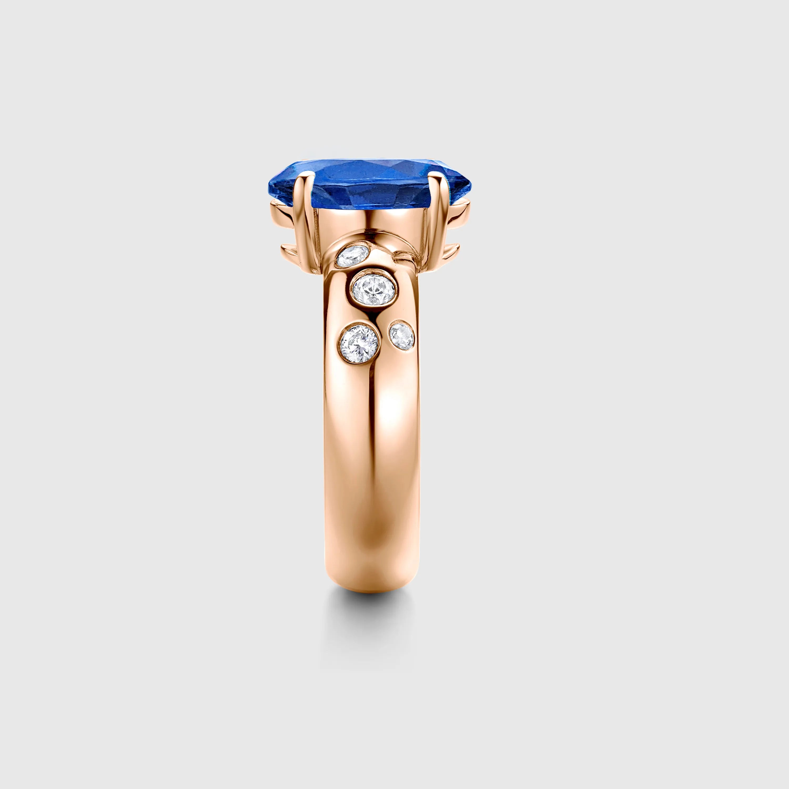 Oval Sapphire Engagement Ring with Bezel Side Accents