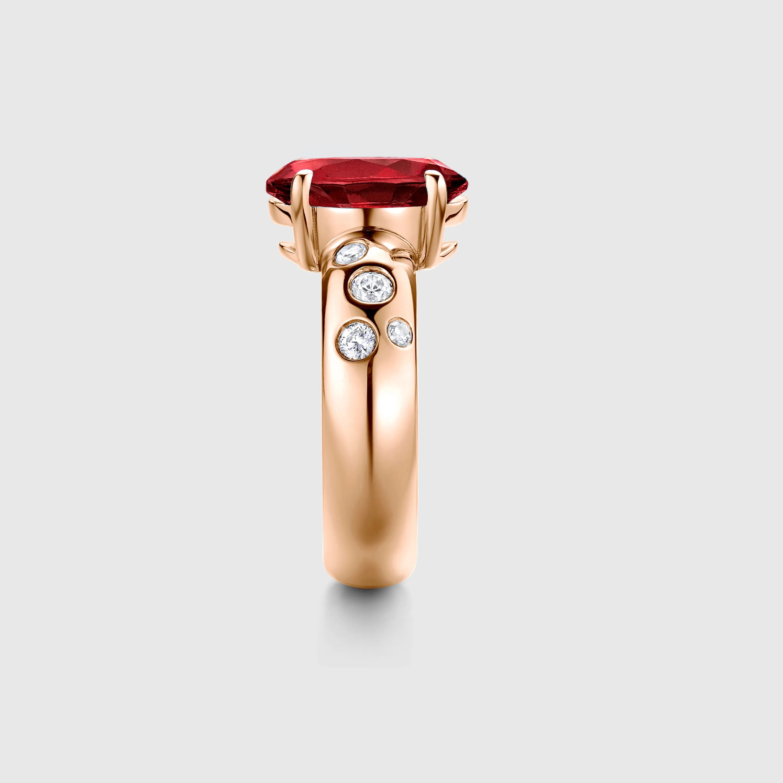 Oval Ruby Engagement Ring with Bezel Side Stones