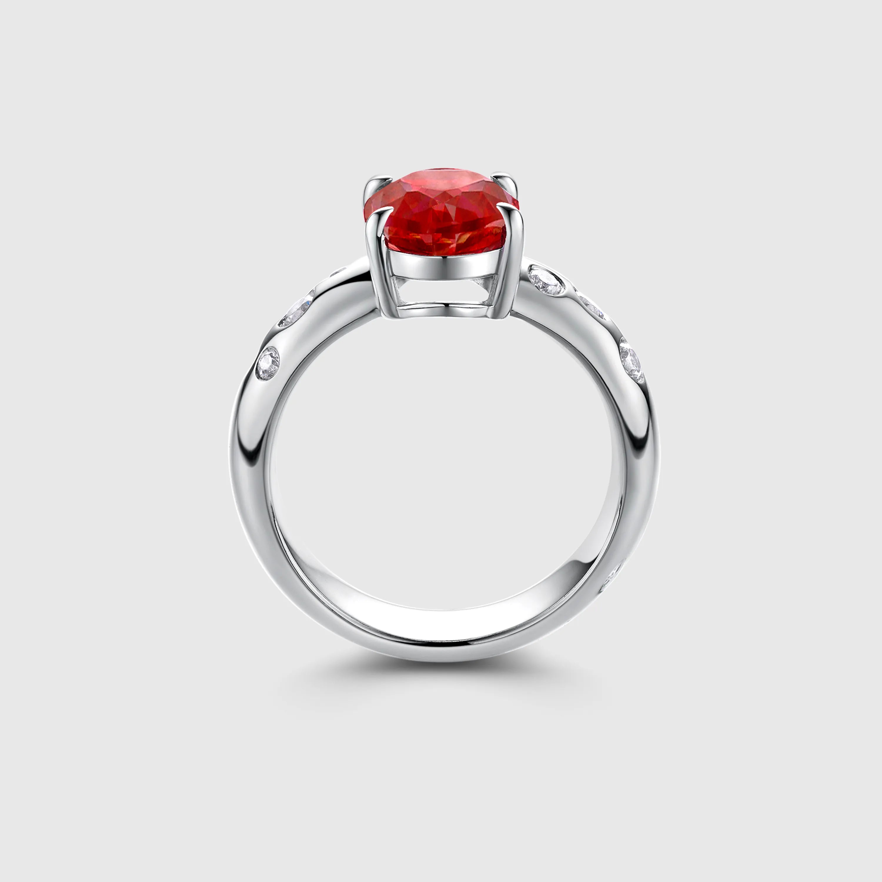 Oval Ruby Engagement Ring with Bezel Side Stones
