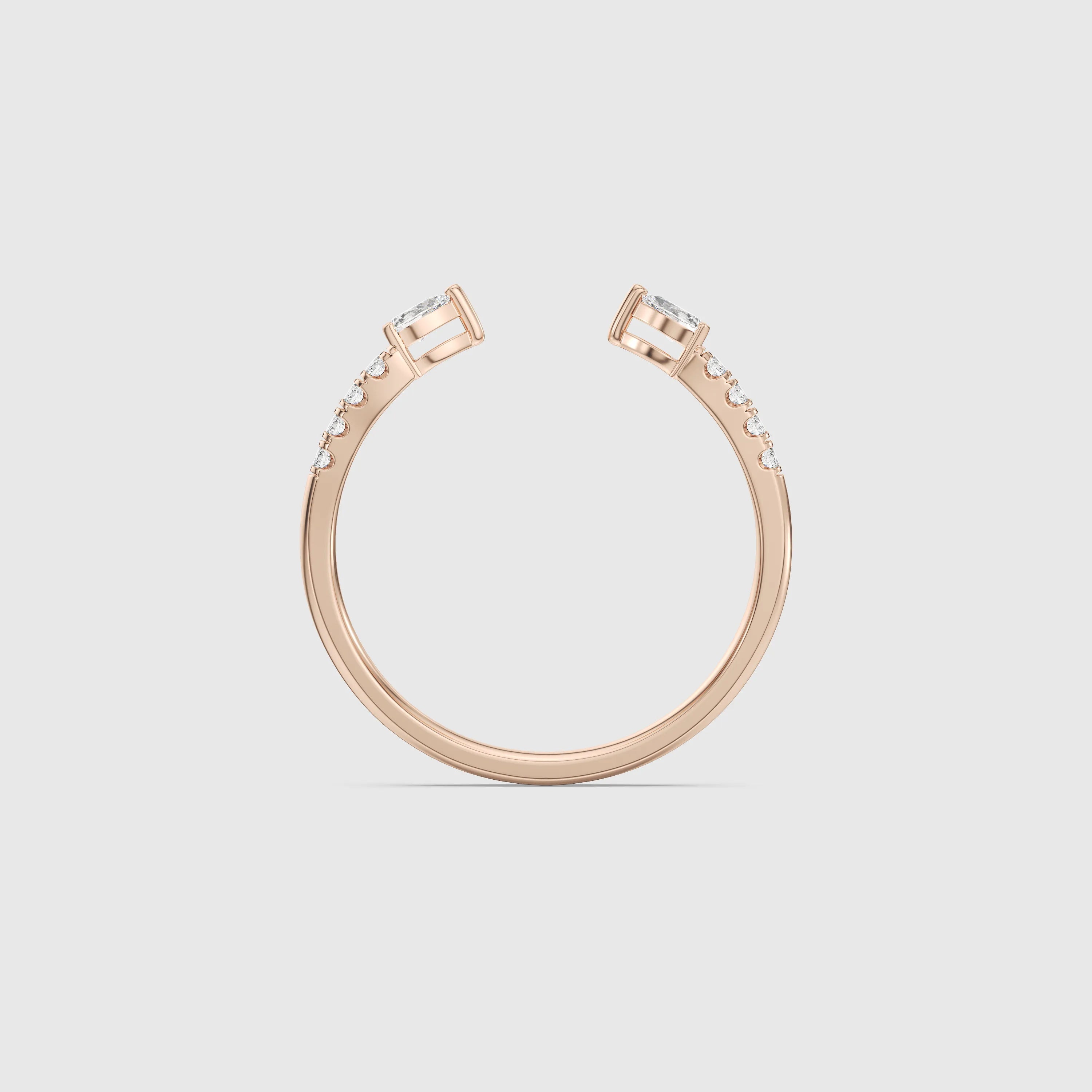 Bague minimaliste avec diamants en forme de poire et de rond