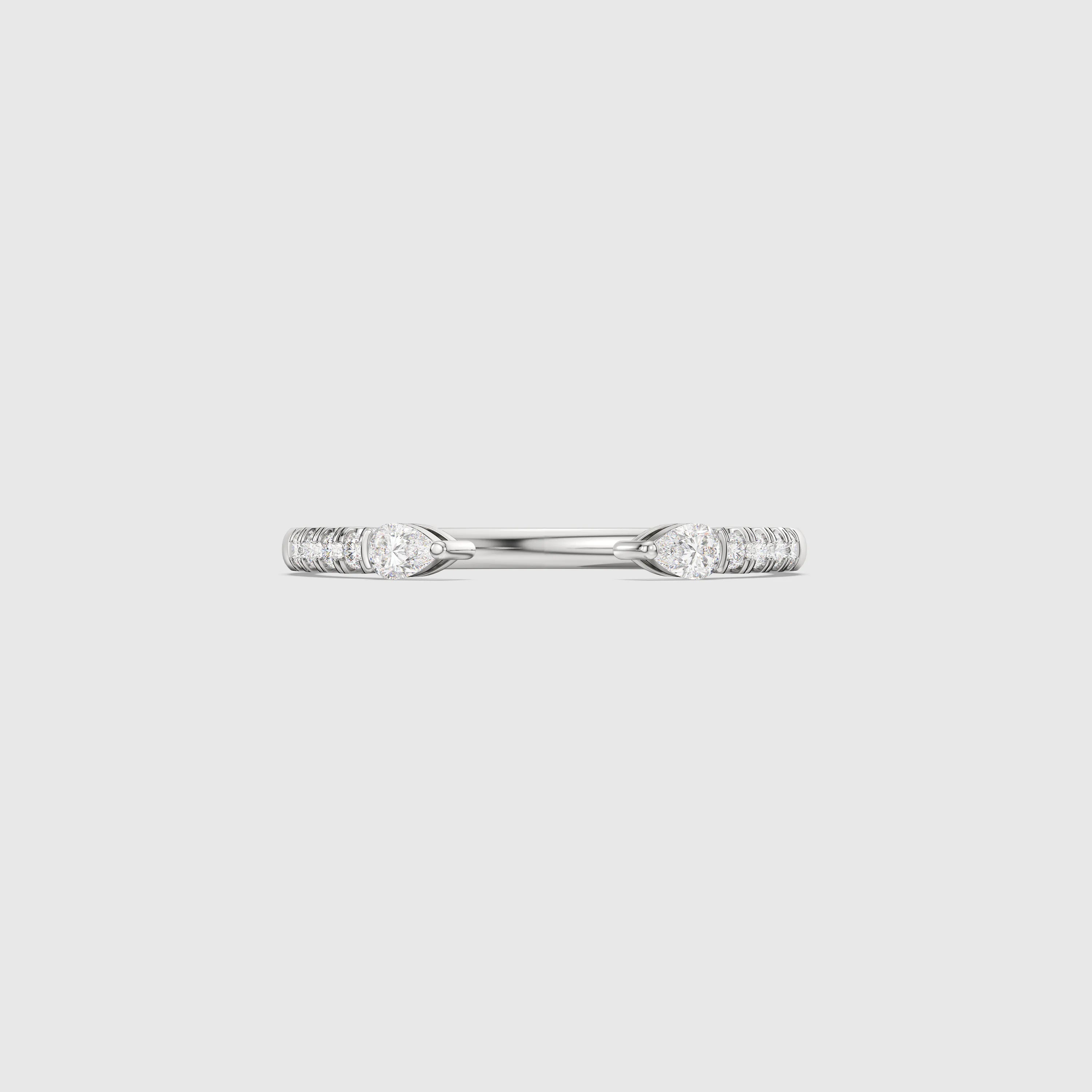 Bague minimaliste avec diamants en forme de poire et de rond
