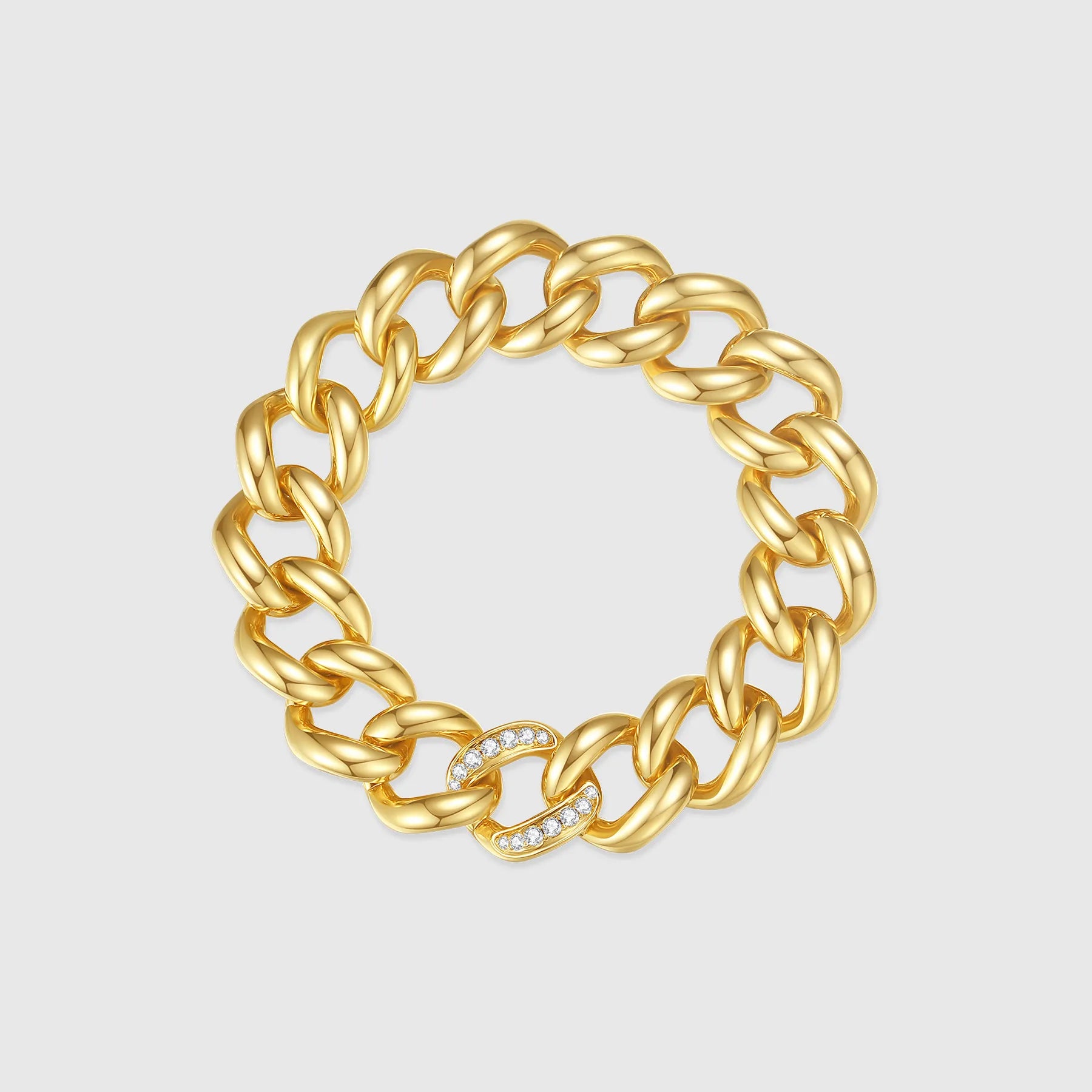 Gold Cuban link bracelet with diamond pavé link