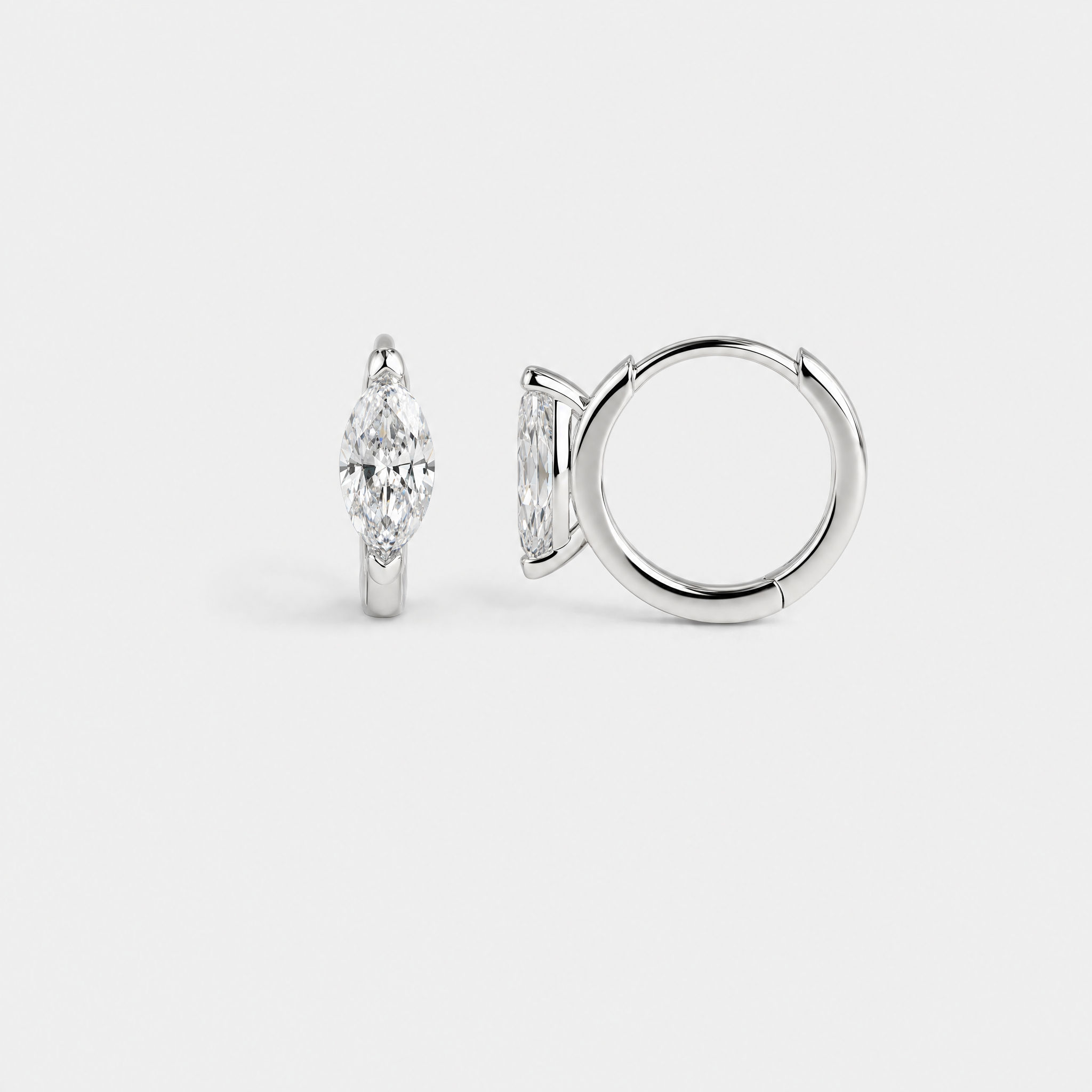 Rear profile view of marquise-cut hoop earrings in white gold showing the hoop closures and stone settings.