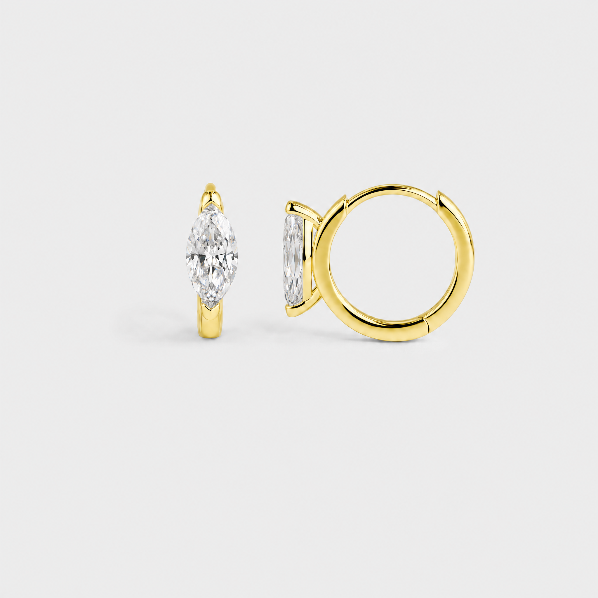 Rear profile view of marquise-cut hoop earrings in yellow gold showing the hoop closures and stone settings.