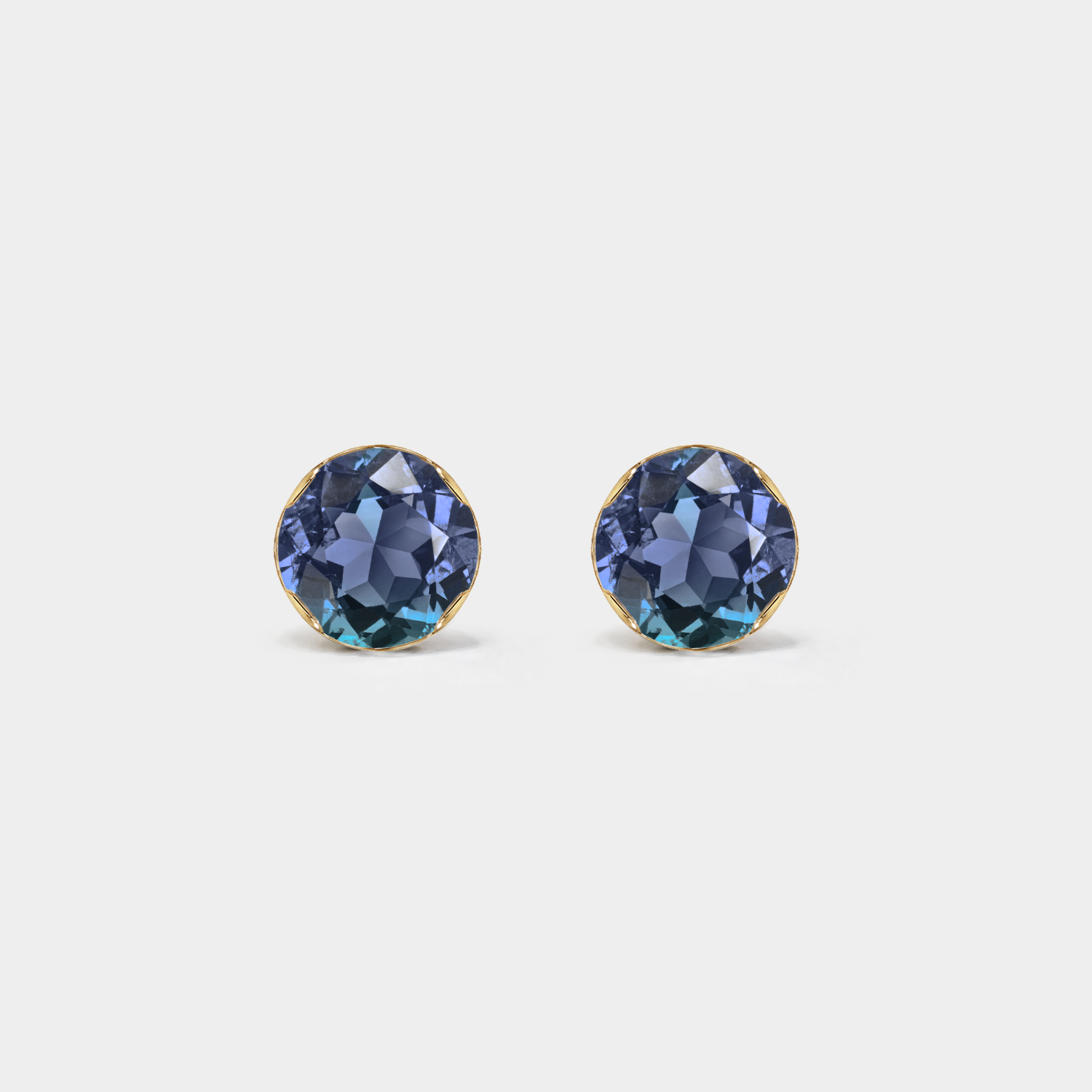 Front view of round lab-grown alexandrite stud earrings in yellow gold on a white background.