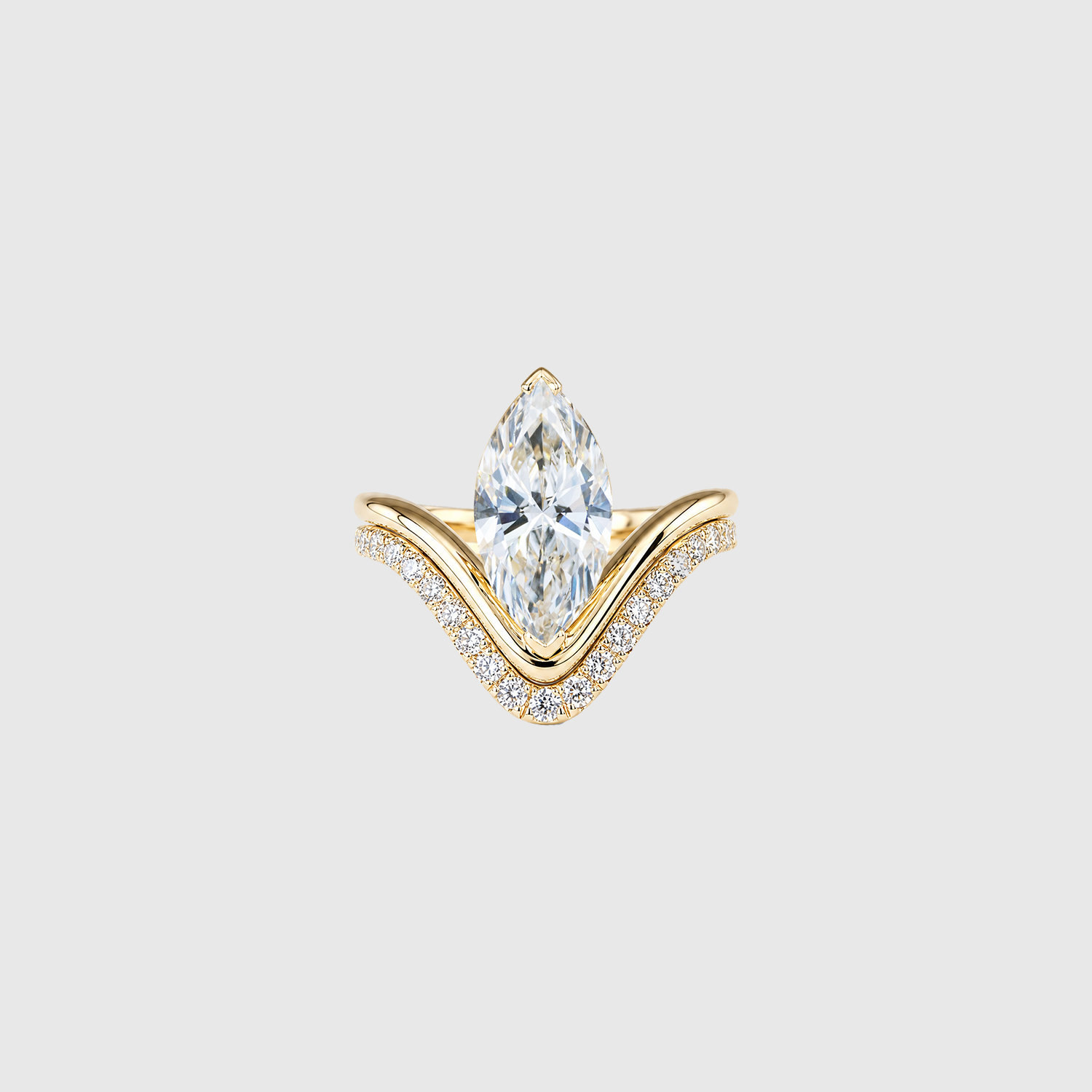 Marquise lab-grown diamond two-piece ring set in yellow gold, front view.