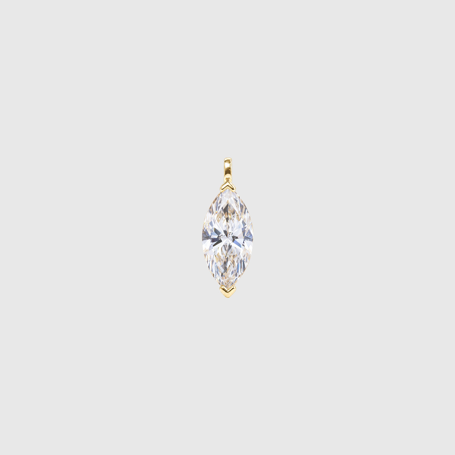 Front view of a marquise-cut solitaire pendant in yellow gold with protective tip prongs.