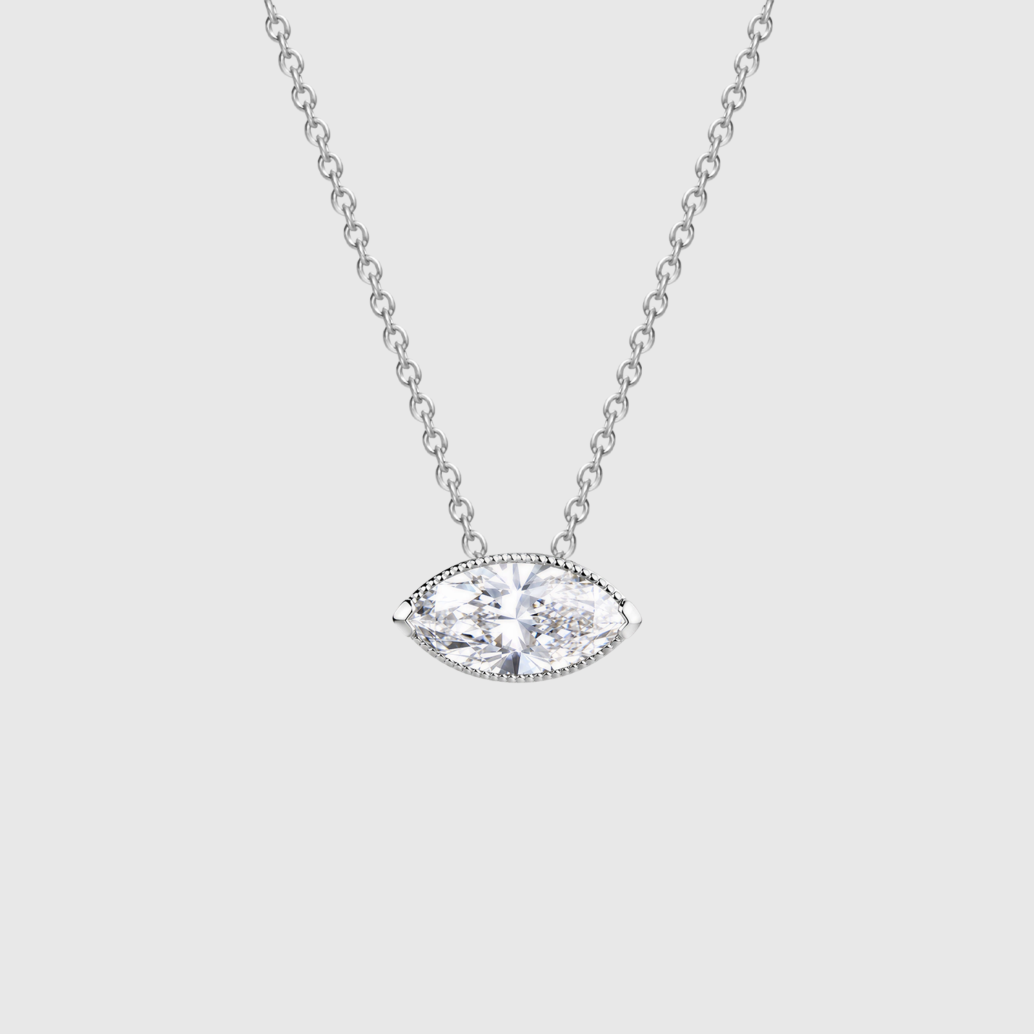 Marquise-cut diamond pendant in white gold displayed on a matching fine chain.
