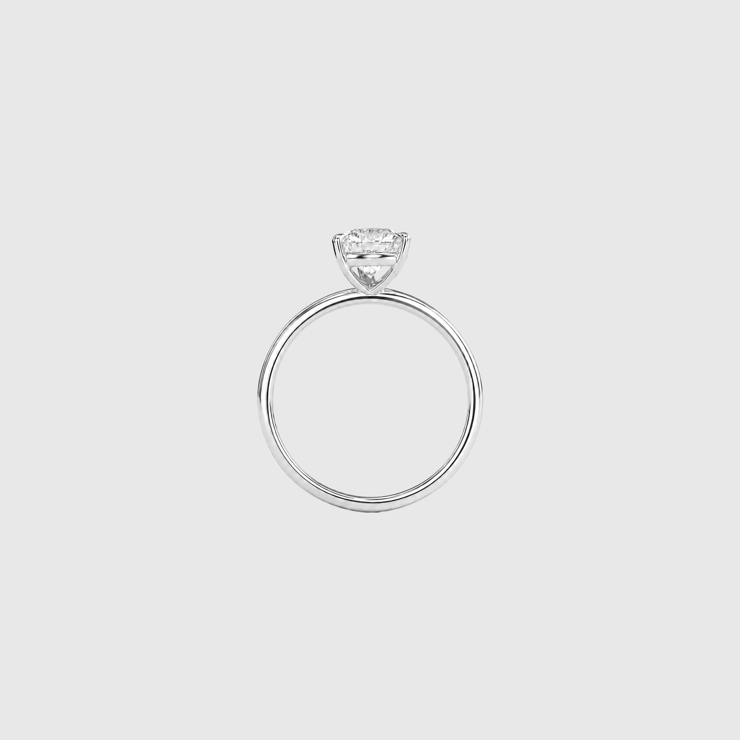 Pear-shaped lab-grown diamond solitaire engagement ring in white gold, back view.