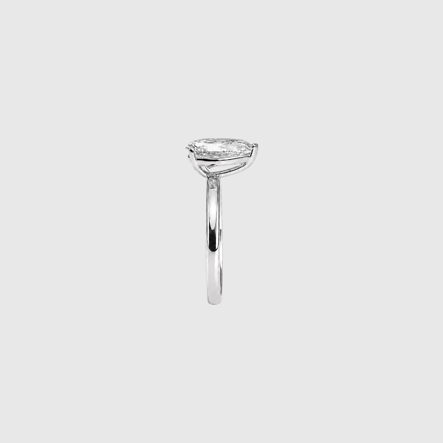 Pear-shaped lab-grown diamond solitaire engagement ring in white gold, side view.