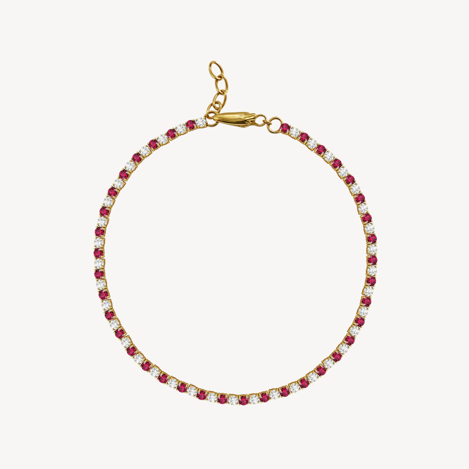 Gold bracelet with diamond and ruby on a white background