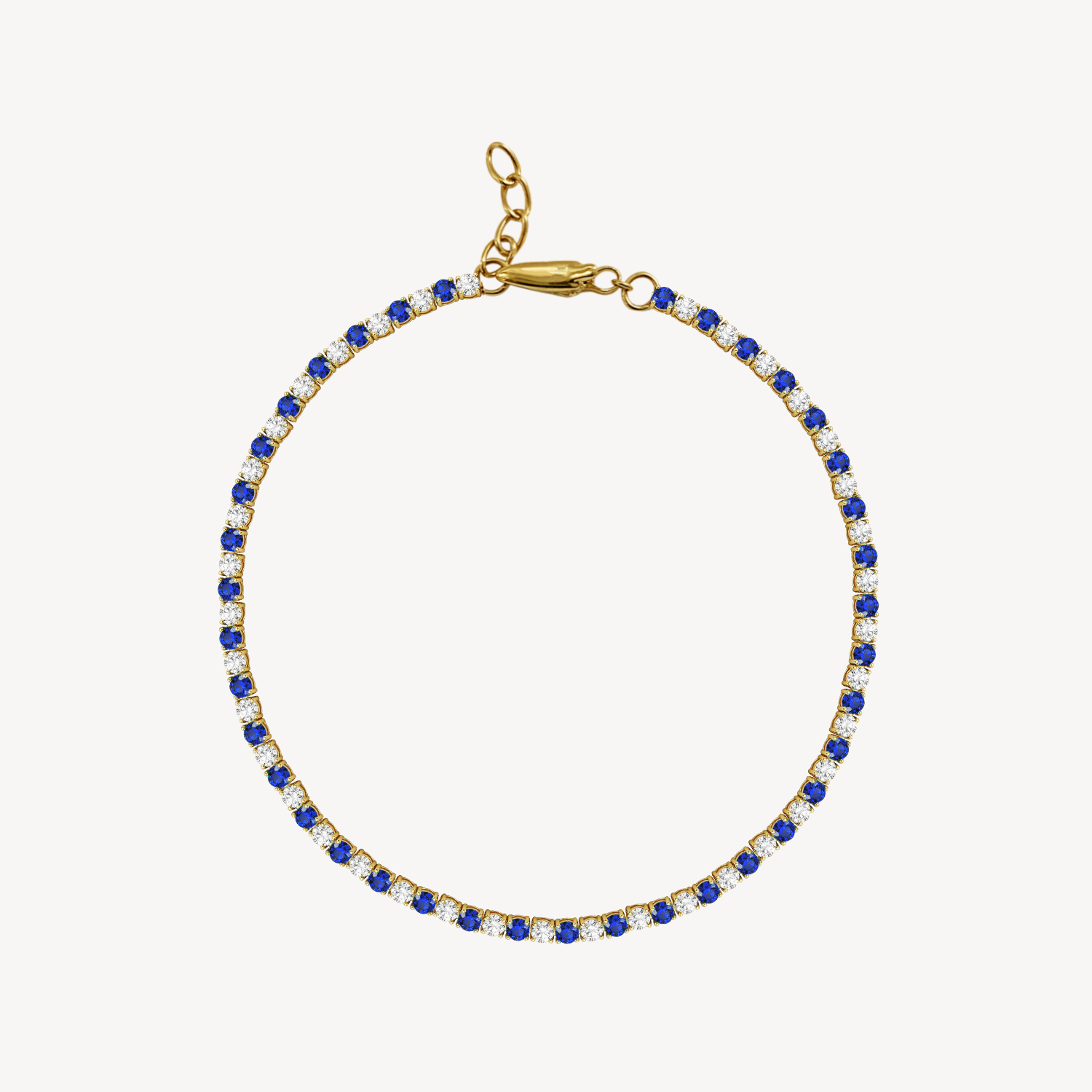 Bracelet with diamonds and  blue sapphire on a white background