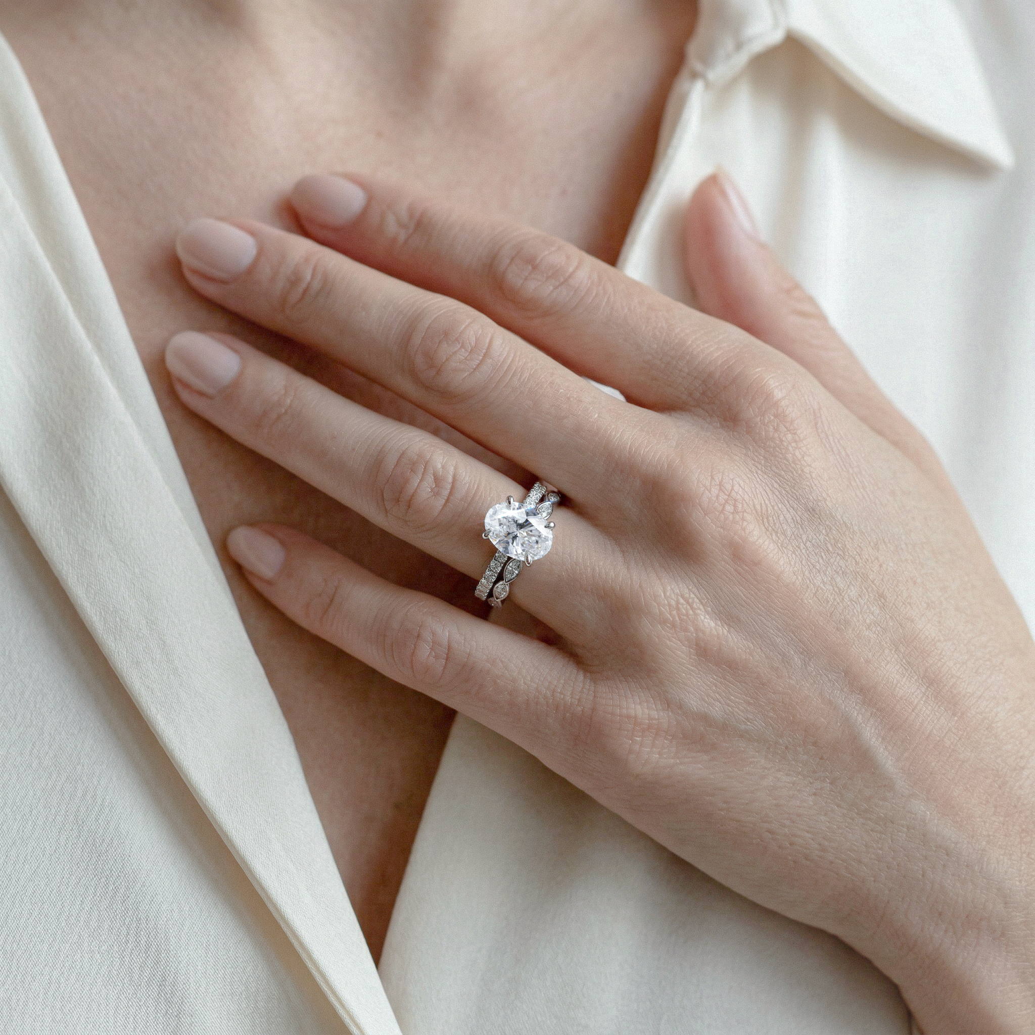 Vintage-Inspired Oval Diamond Ring with Scalloped Gold Band