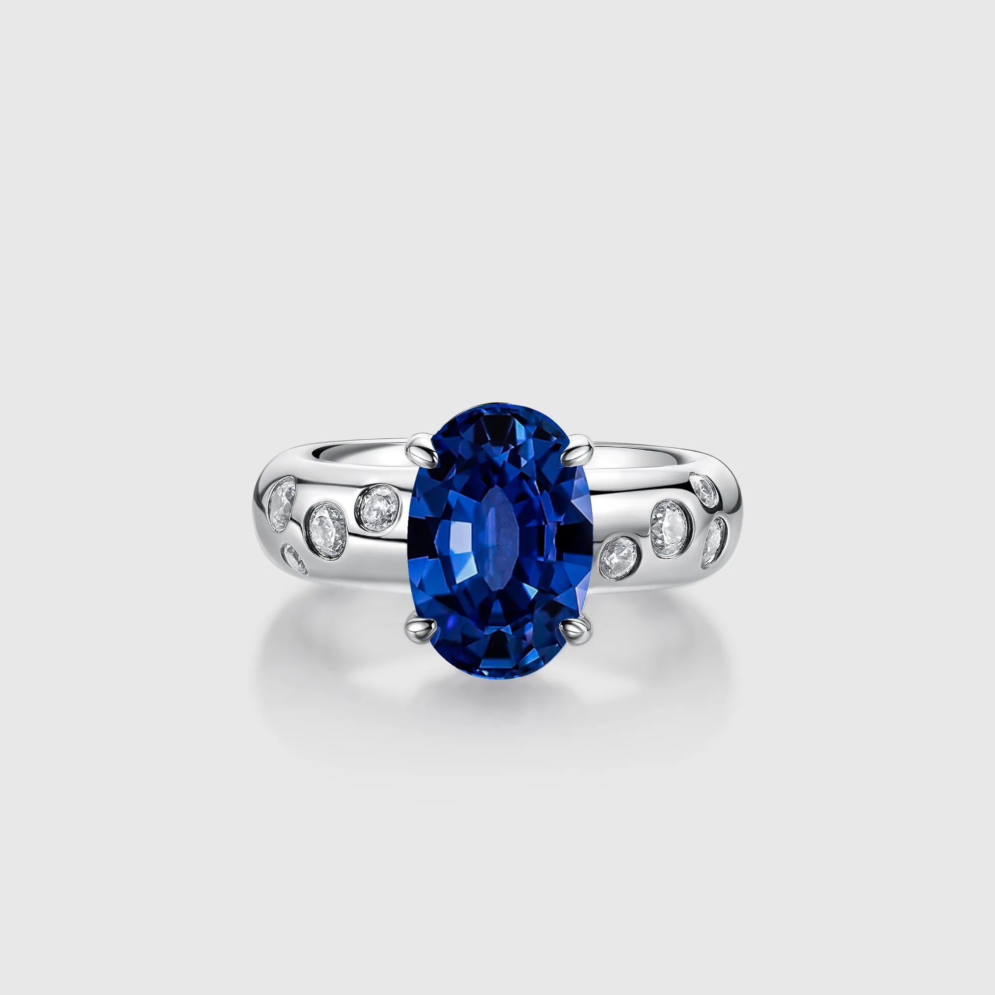 Oval Sapphire Engagement Ring with Bezel Side Accents
