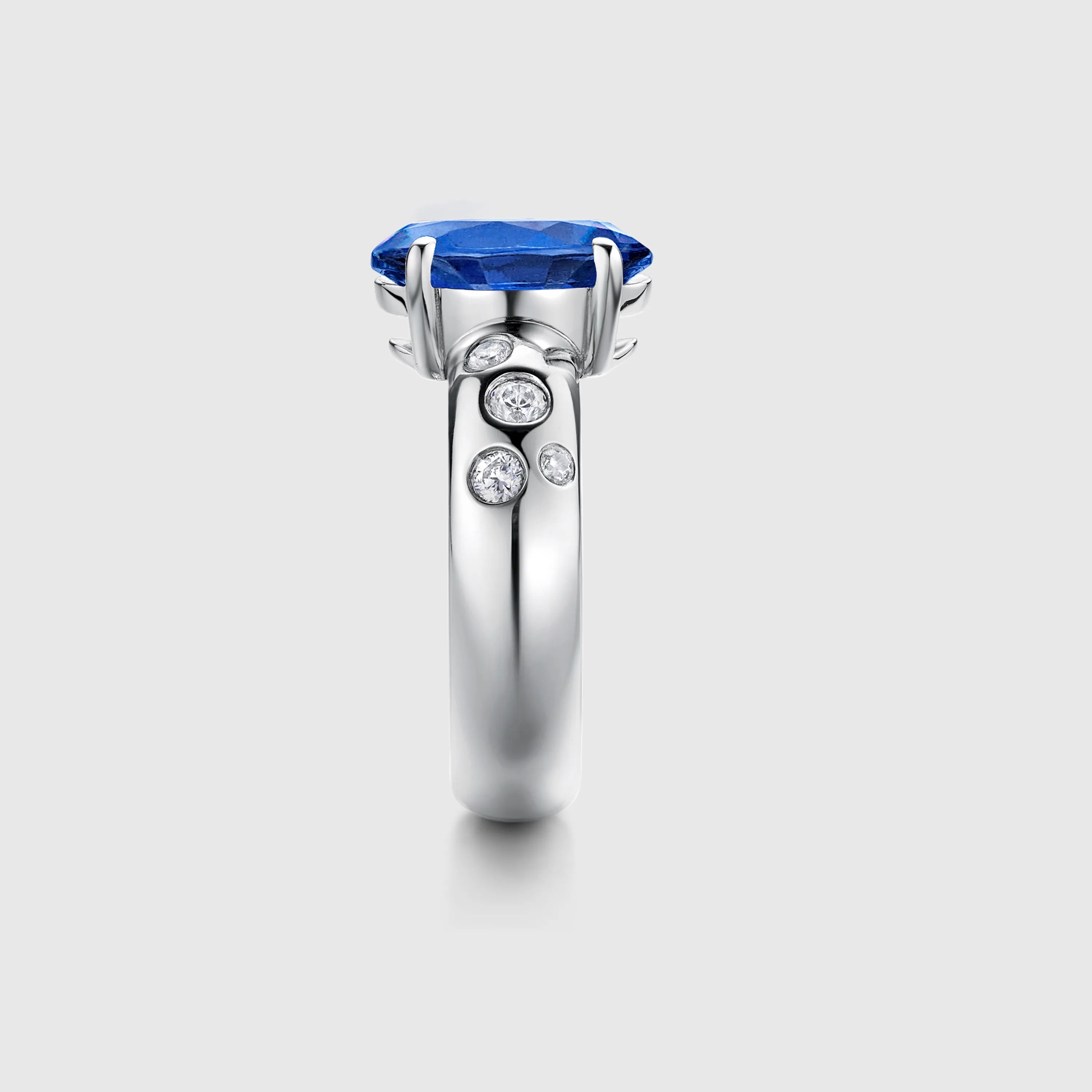 Oval Sapphire Engagement Ring with Bezel Side Accents