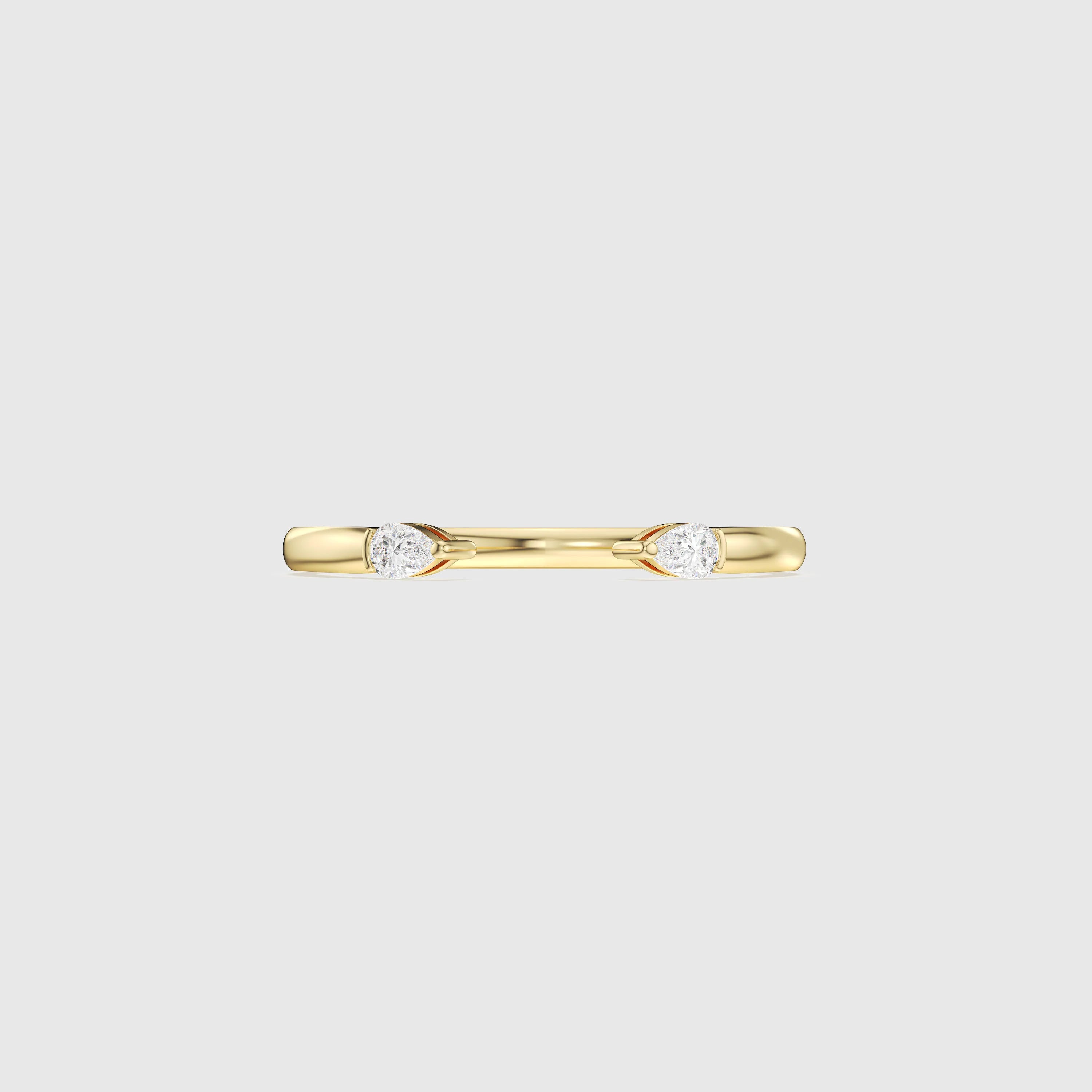 Bague minimaliste avec diamants en forme de poire et de rond