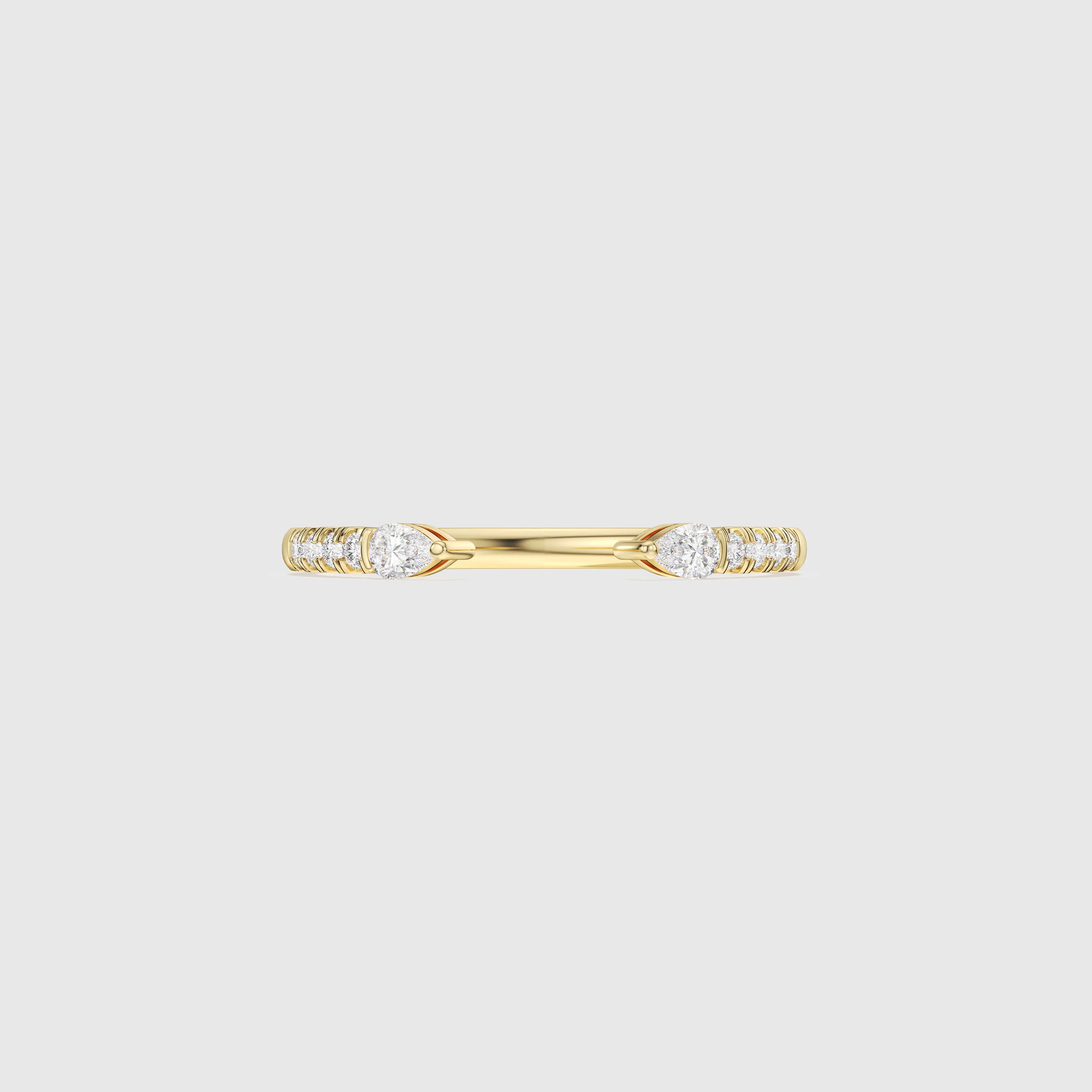 Bague minimaliste avec diamants en forme de poire et de rond