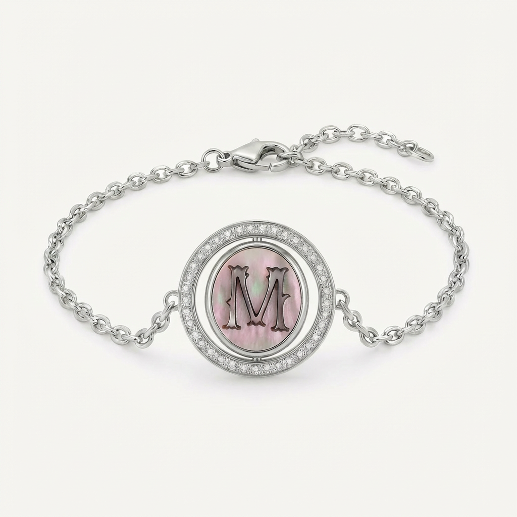 Reversible personalized initial diamond necklace with a black mother-of-pearl background, shown on a 925 sterling silver chain.