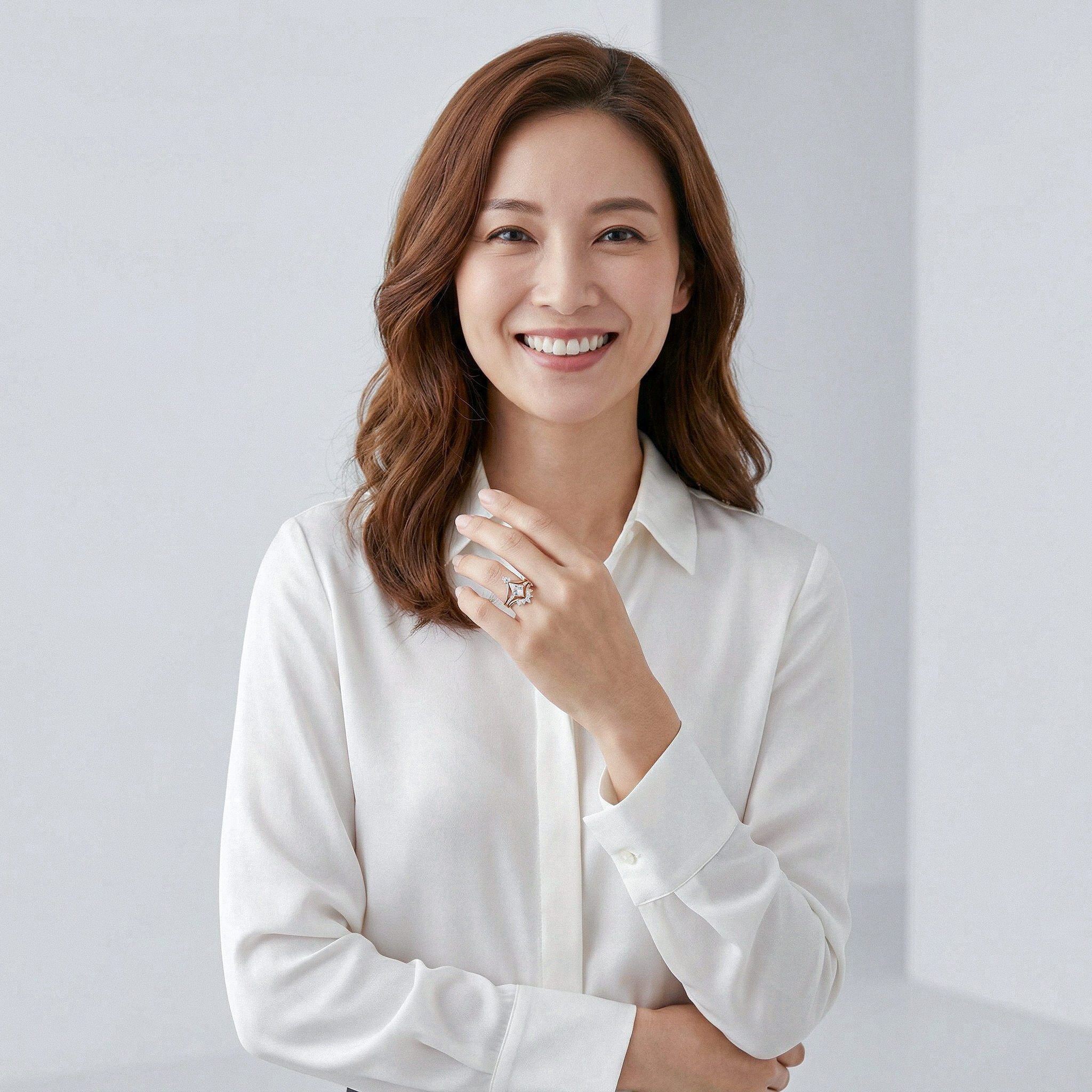 Woman wearing  golden kite shape diamond ring set against a light gray background