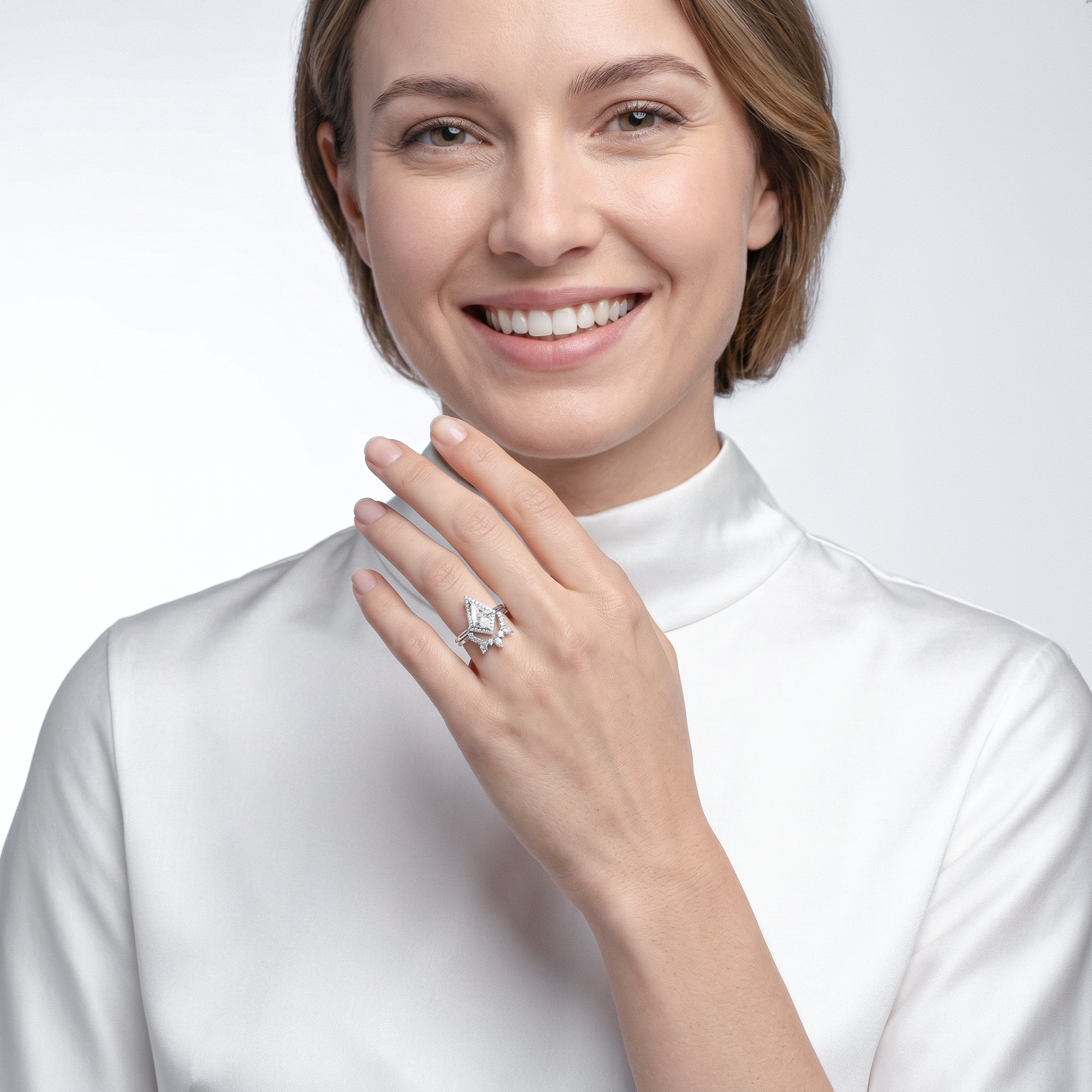 Woman wearing halo kite shape diamond ring set 2pcs on a plain background