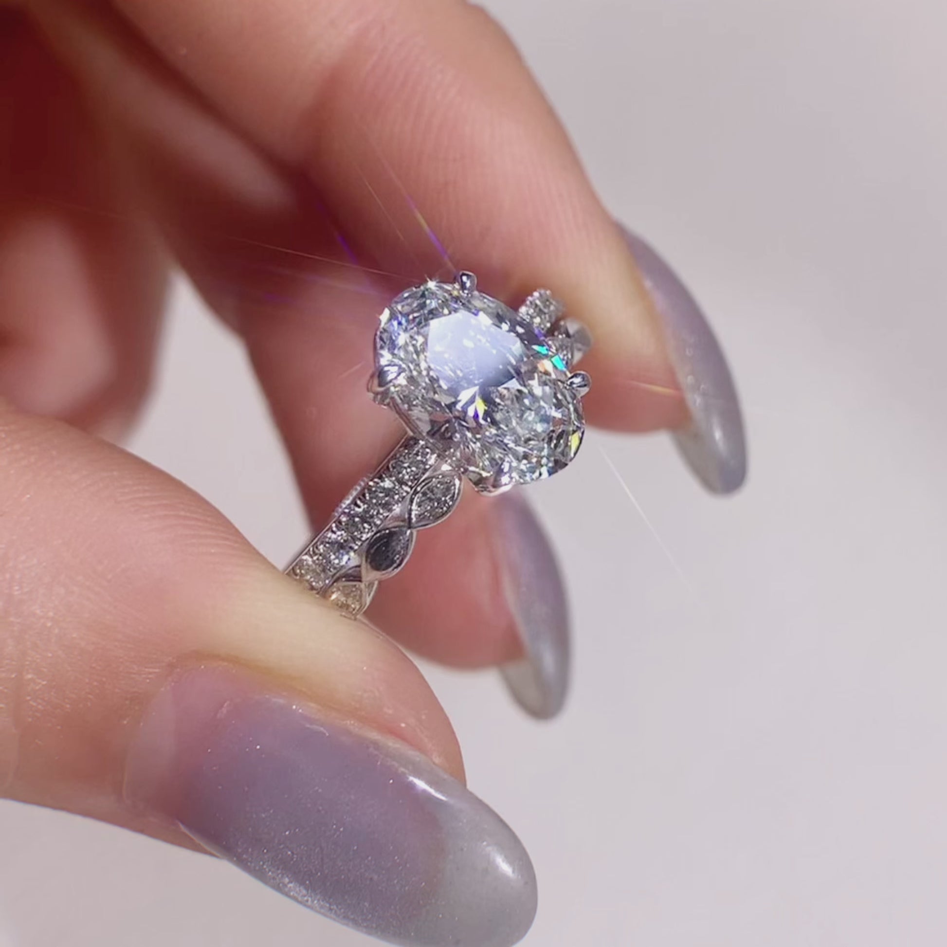 oval diamond with marquise diamond band 