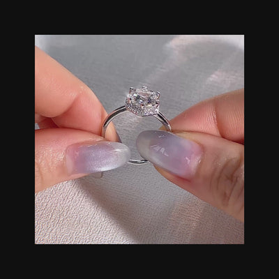 wearing a hexagon halo diamond ring 