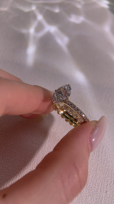 oval cut  pave diamond ring stack with round vintage diamond band
