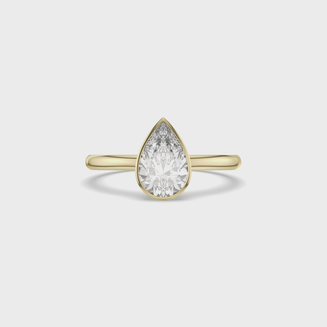 Pear Cut Bezel Set Diamond Solitaire Ring