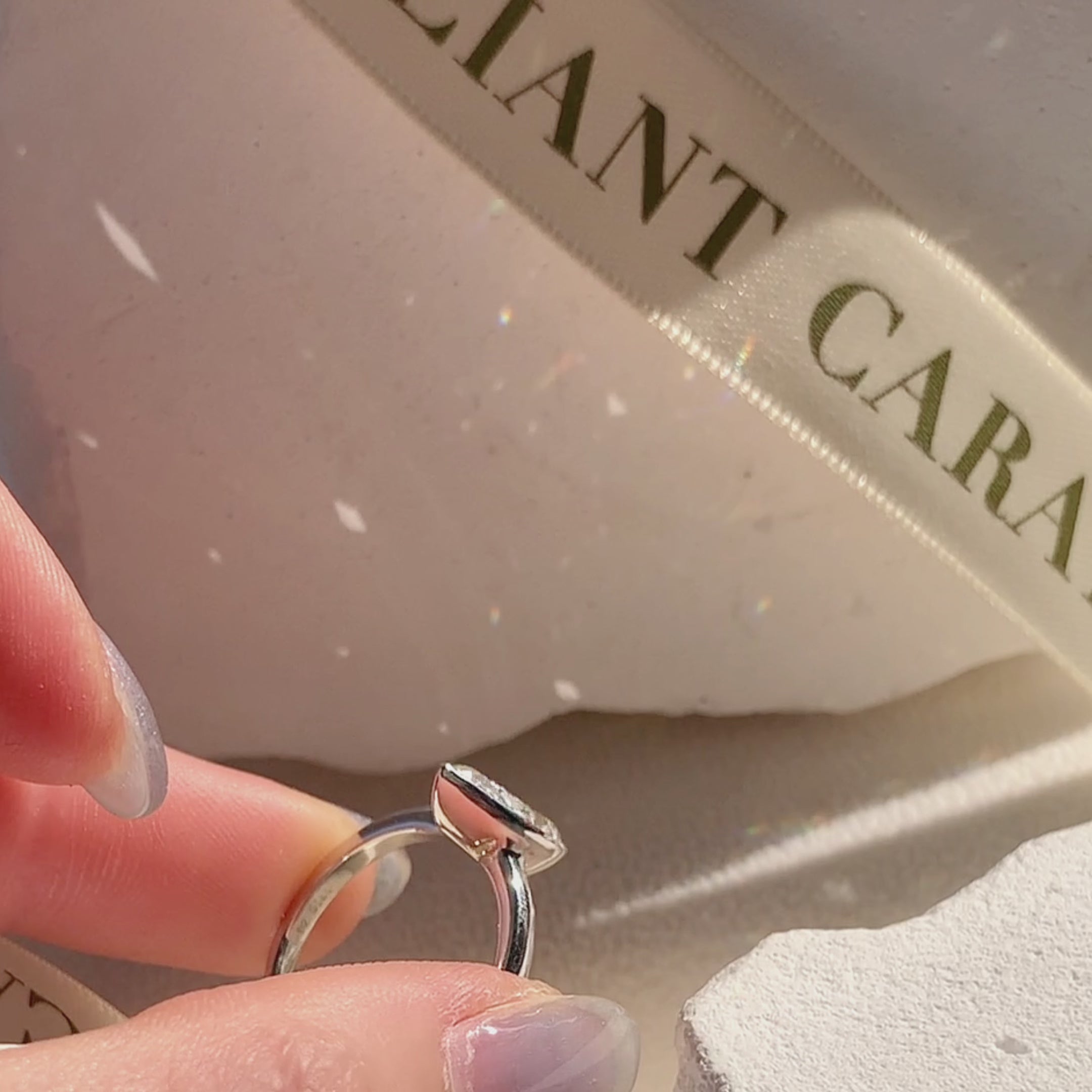 golden pear shape bezel setting diamond ring