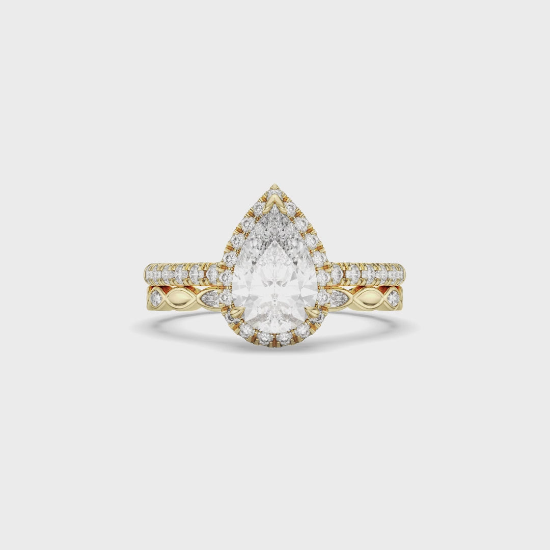 Pear Halo with Marquise Diamond Band