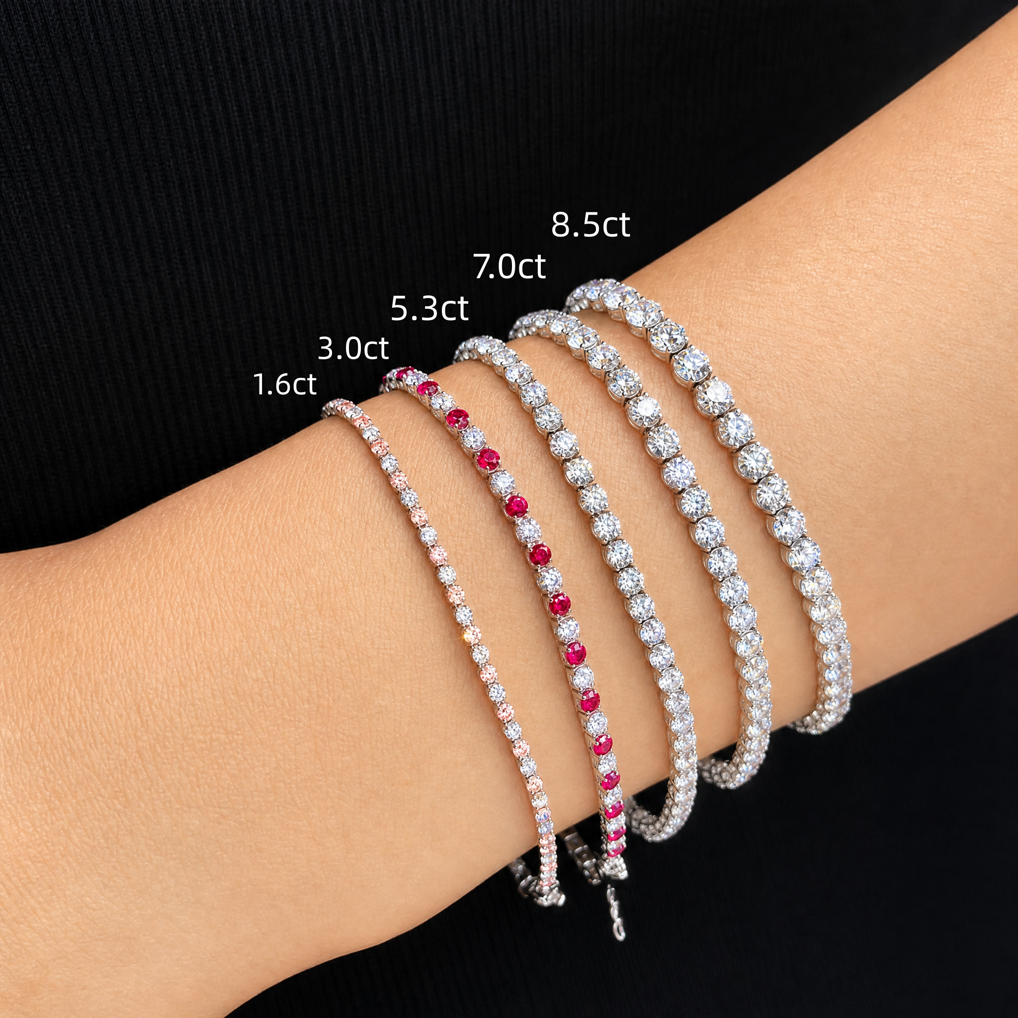 wearing different size of tennis bracelets